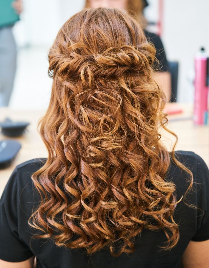 Dimensional curls styled and finished